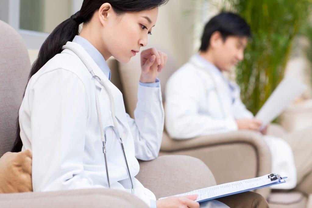 Doctors reading files