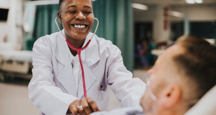 Doctor doing a checkup on a hospitalized patient
