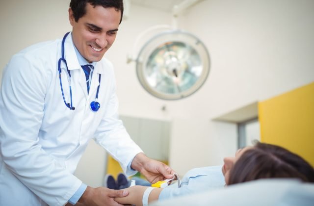 Doctor examining a patient