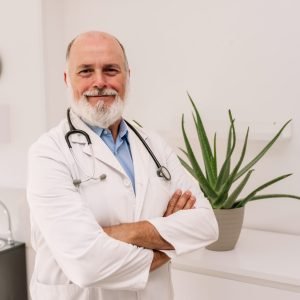 portrait of the senior doctor looking into the camera